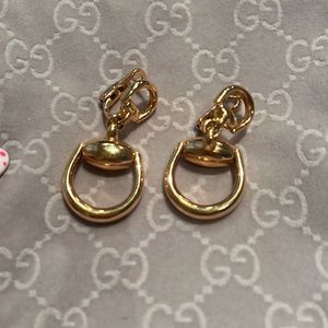 Gucci 18kt rose gold horse-bit earrings.